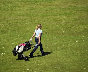 Woman with Complete Golf Club Set